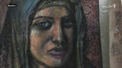 شامی هنرمند پر پخوانیو کتابونو او قالینو انځورګري کوي