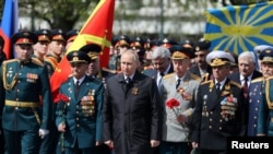 Президент Росії Путін, який надав наказ розпочати війну проти України, на параді до Дня перемоги у Другій світовій війні, який в Росії відзначають 9 травня. Москва, Росія