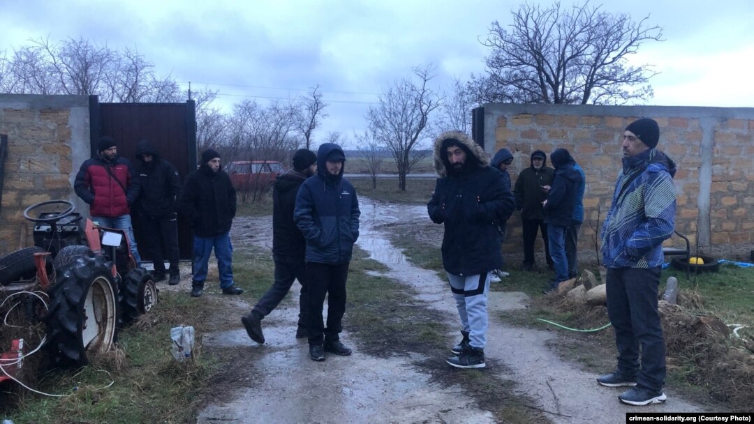 The detained men's relatives said on February 9 that no reason was given for the searches or the detention of the four men.