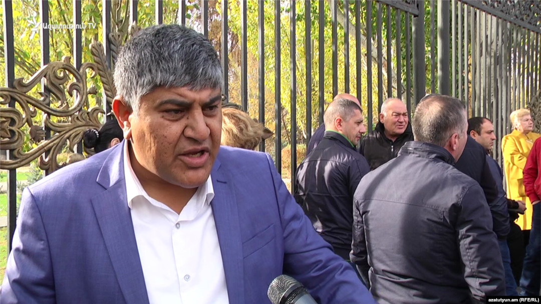 Traders protest in front of parliament in Yerevan on November 14.