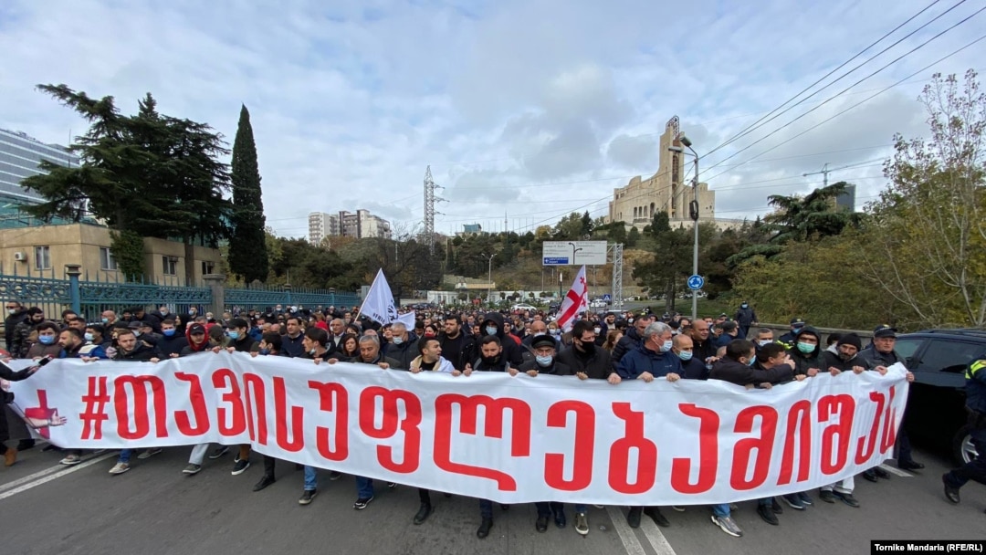 Supporters of Mikheil Saakashvili march in Tbilisi on November 12.