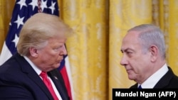 Američki predsednik Donald Tramp i izraelski premijer Benjamin Netnjahu na predstavljanju mirovnog plana SAD u Vašingtonu, 28. januara 2020.