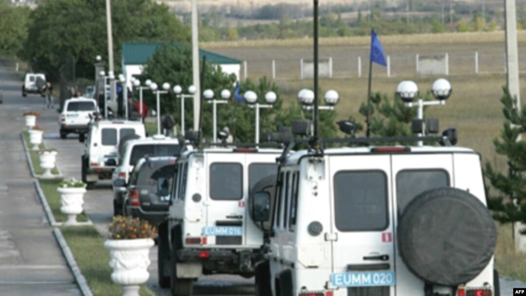 EU vehicles leave a base in the Georgian town of Mukhrani for cease-fire monitoring in October 2008, just two months after the brief Georgia-Russia conflict.