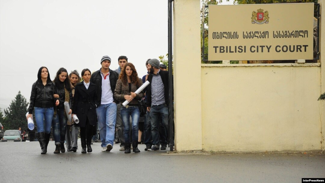 Supporters of former Interior and Defense Minister Bacho Akhalaia arrive at a city court building in Tbilisi on November 9.