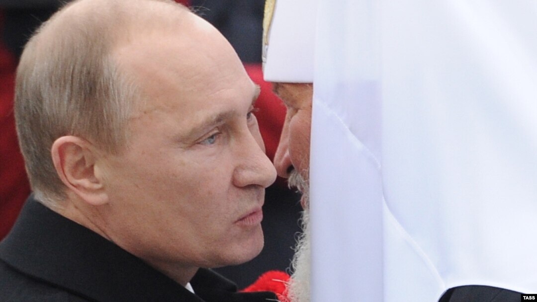 Володимир Путін (ліворуч) і керівник РПЦ Кирило