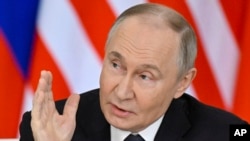 V.Putin