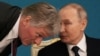 Спикер Кремля Дмитрий Песков (слева) и президент РФ Владимир Путин