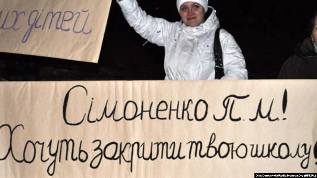 People in Donetsk protest against closure of a school with education in Ukrainian.