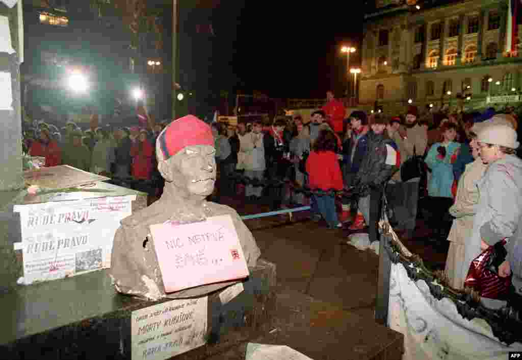 A bust of former Soviet leader Josef Stalin, with a caption reading &quot;Nothing lasts forever,&quot; is seen on Prague&#39;s Wenceslas Square on the first day of a general strike, November 27.