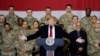 Президент США Дональд Трамп выступает с речью перед войсками США во время необъявленного визита на авиабазу Баграм недалеко от Кабула 28 ноября 2019 года.