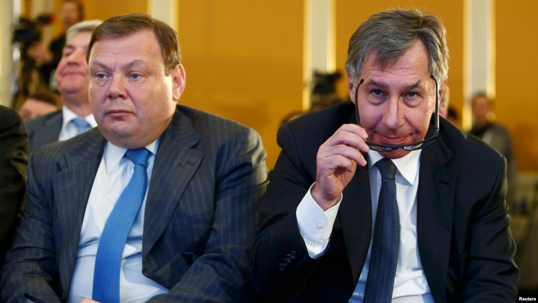 Petr Aven (right) and Mikhail Fridman have filed a defamation suit in the United States (file photo).
