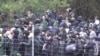 Нелегальні мігранти з білоруського боку штурмують польський кордон біля Кузниці Білостоцької. 8 листопада 2021 року