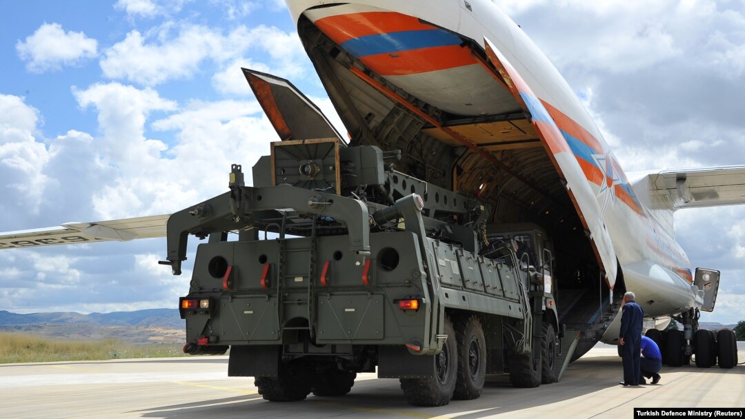 The first parts of a Russian S-400 missile defense system are unloaded from a Russian plane near Ankara on July 12.