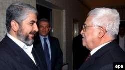 محمود عباس و خالد مشعل، رهبران شاخه سیاسی فتح و حماس