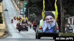 در این تصویر از اکتبر سال ۲۰۱۹ هواداران حزب‌الله لبنان در نزدیکی مرز این کشور و اسرائیل دیده می‌شوند 