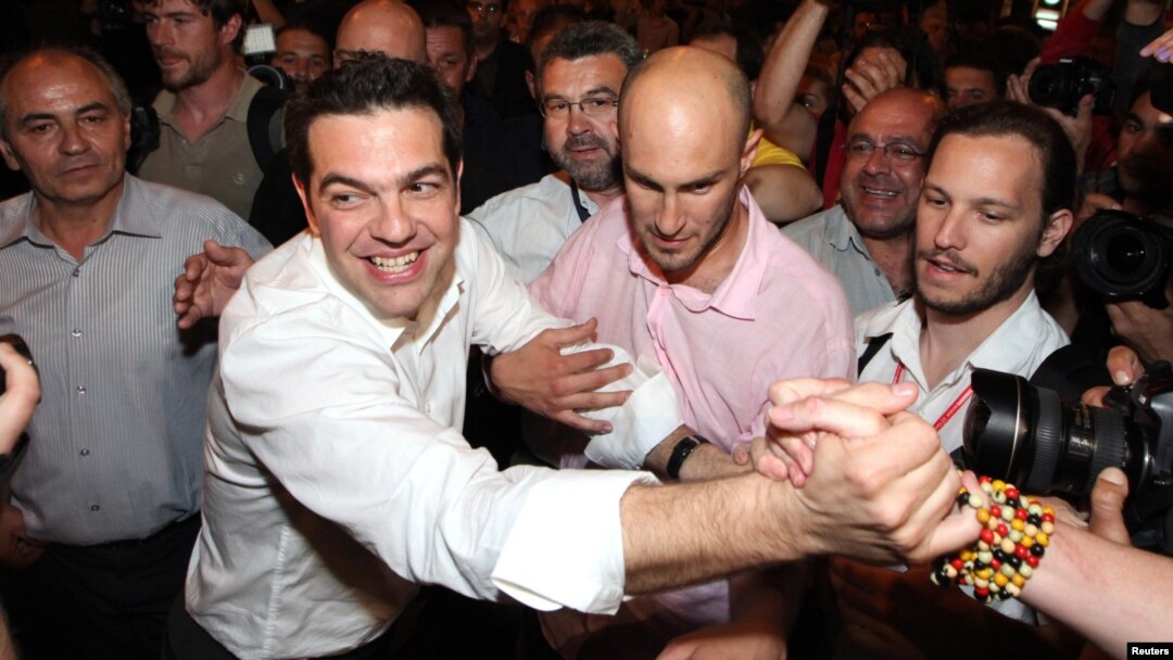 The head of Greece's Left Coalition party, Alexis Tsipras, celebrates with supporters in Athens on May 6. 