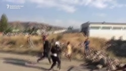 Former Kyrgyz President’s Supporters Attack Police With Stones