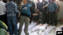 ناظران سازمان ملل در سردخانه بیمارستانی در حوله