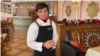 Tajikistan - 21-year-old Karomatullo Sodikzoda is a student who works part-time at the Pilaf Center in Khujand.