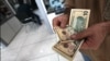 افزایش نرخ ارز، سکه و مسکن در ایران؛ دلار در حدود ۱۴ هزار و ۳۰۰ تومان