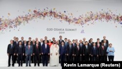 «Чоң жыйырманын» курамына эң өнүккөн жана өнүгүп келе жаткан 19 өлкө жана Европа Биримдиги кирет. Осака, Жапония. 28-июнь, 2019-жыл.