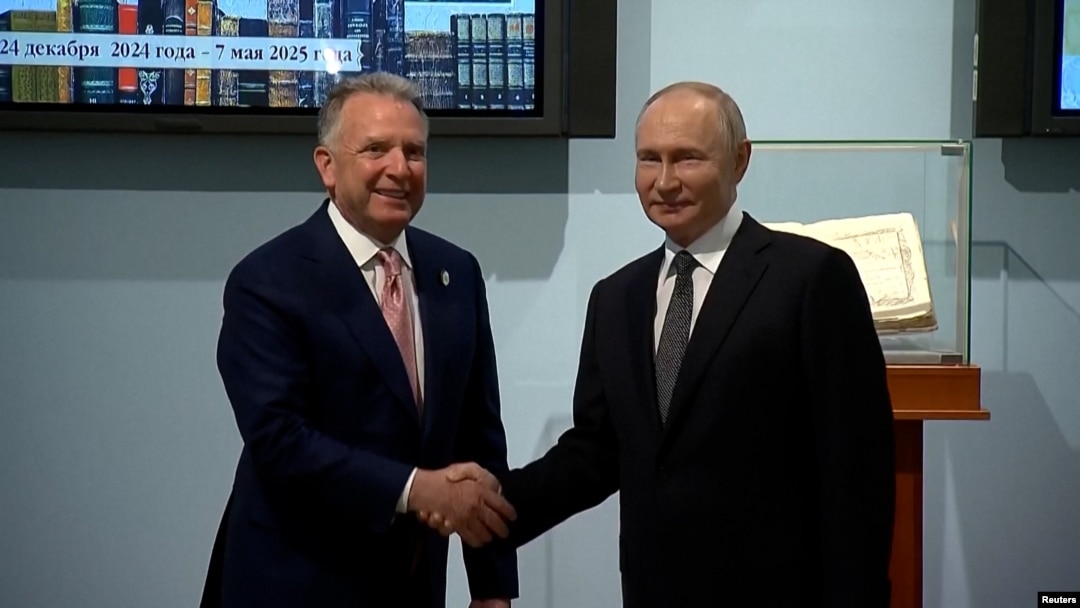 Stiven Uitkoff və Vladimir Putin 