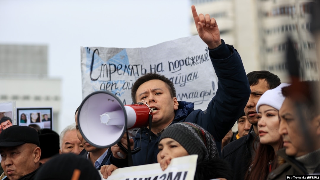 Zhanbolat Mamai speaks at a rally in memory of those killed during the January events, in Almaty in February 2022.