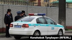Полиция қызметкерлері. Көрнекі сурет.