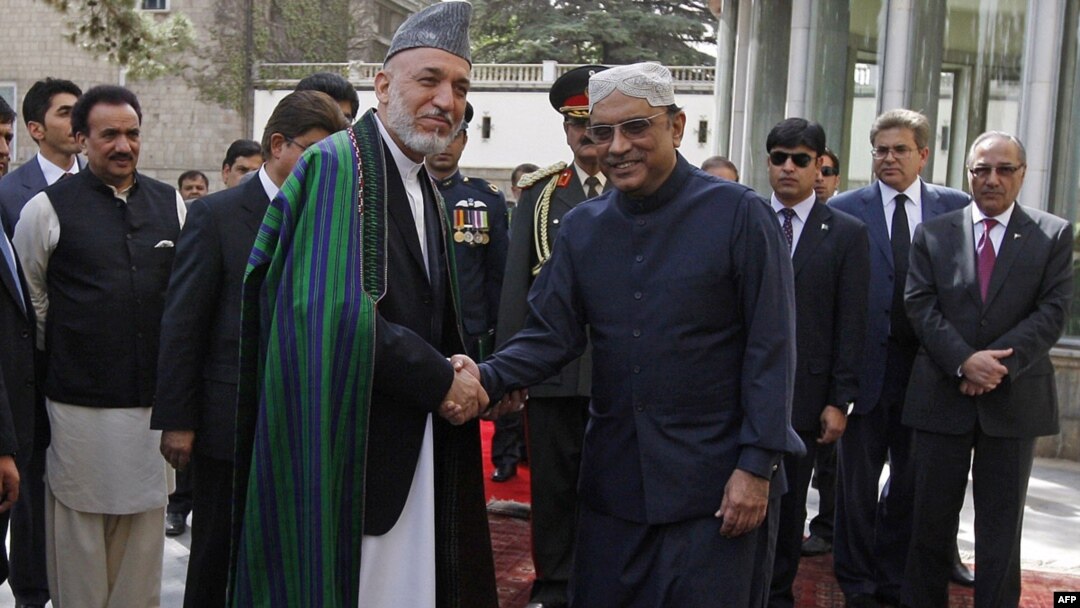 Afghan President Hamid Karzai and his Pakistani counterpart, Asif Zardari, were trying to overcome mutual distrust on the first day of talks in Istanbul.