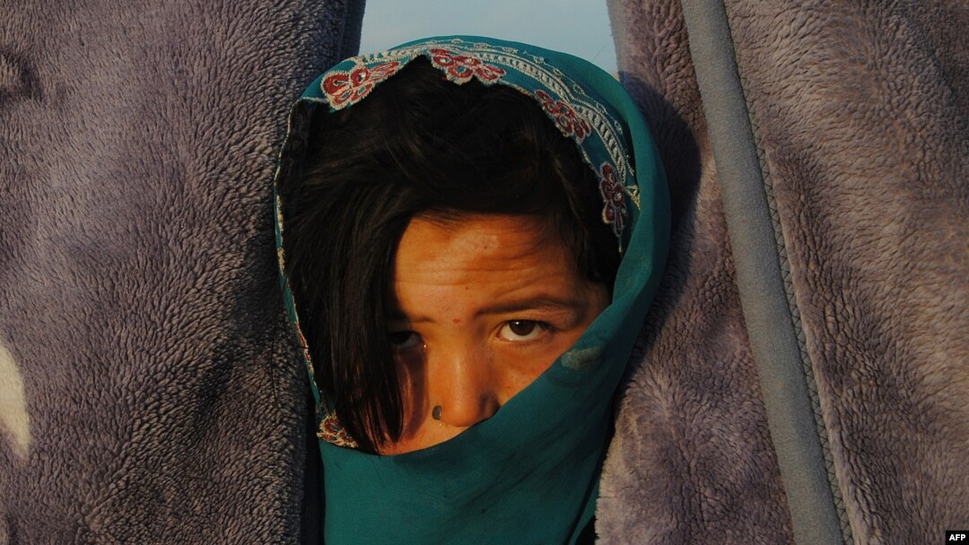 A child at a camp for returning refugees in Qala-e Qul Mohammad on the outskirts of Mazar-e Sharif, Afghanistan, in April