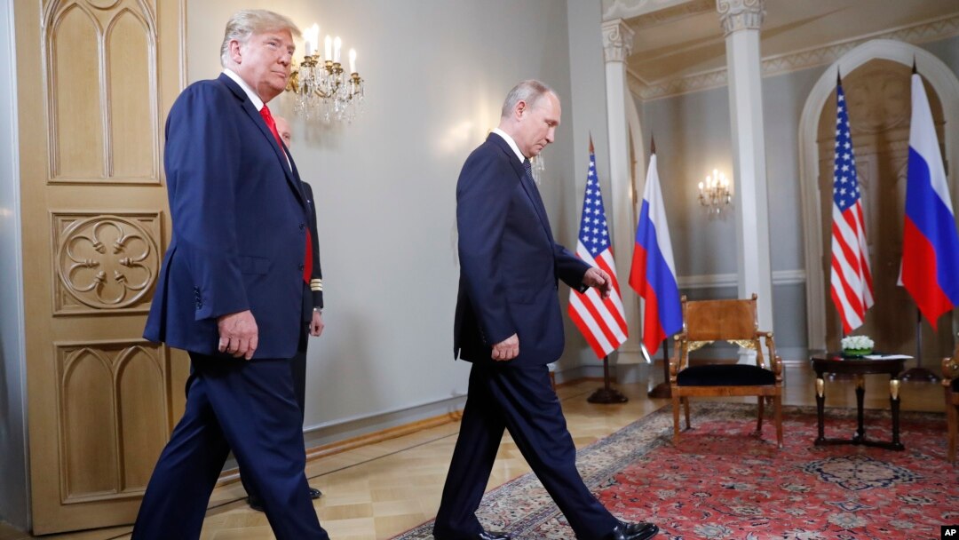 Donald Trump și Vladimir Putin la summitul din Finlanda, 16 iulie 2018.
