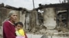 Uzbek Women Hide In Osh Basement As Humanitarian Disaster Looms On Border