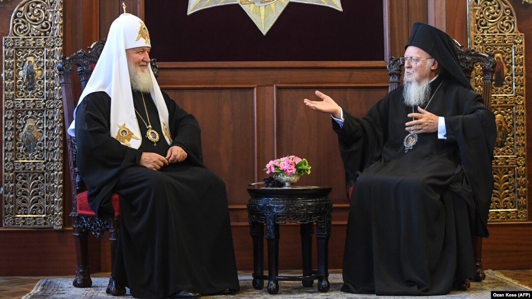 Russian Orthodox Church Patriarch Kirill (left) and Orthodox Ecumenical Patriarch Bartholomew I meet at St. George Church in Istanbul on August 31. 